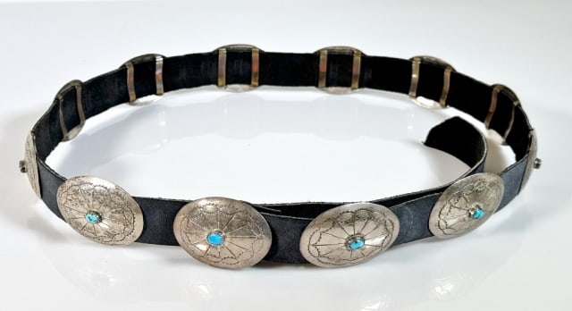 Vintage Navajo Old Pawn Silver Concha Belt: Vintage Navajo Old Pawn Silver and Turquoise Concha Belt. Leather strap belt fitted with twelve hand chased sterling silver plates set with natural turquoise stones. Good condition, measures: 41" L.