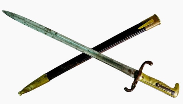 German M1871 Bayonet, Weyersberg Kirchbaum: German Model 1871 Long Bayonet, Signed "WEYERSBURG KIRCHBAUM & CO SOLINGEN". Straight single fullered steel blade with steel guard and cast brass grip with release button. Leather scabbard with brass 