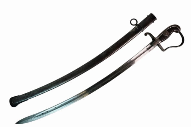 WW1 German Blucher Cavalry Sword, Unit Marked: World War One Model 1811 German Blucher Blade Cavalry Sword matching Unit Marked. Single fullered curved steel blade with steel stirrup guard and pommel. Spine with arsenal proofs and crowned "83", la