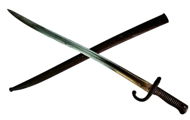 19th C Continental Chassepot Bayonet: 19th C. Continental Chassepot Bayonet. Steel single fullered yataghan blade with steel hooked quillion and cast brass grip and pommel. Bayonet is unsigned. Good condition with bright blade, measures: 