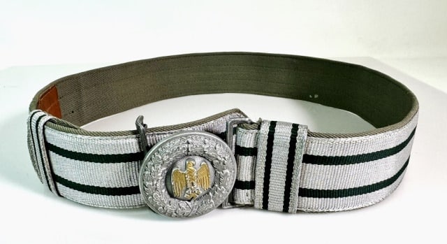 WW2 German Officer Dress Belt and Buckle: World War Two German Officer Dress Belt. Bullion thread, fabric backed belt with die cast wreathed gilt eagle buckle. Good condition, measures: 34" L.