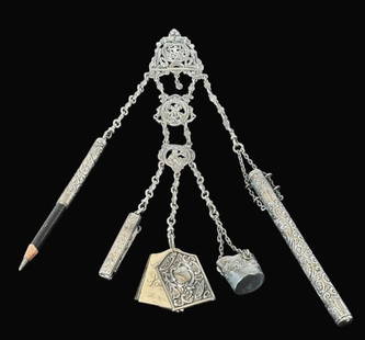 19th C. English Sterling Silver Chatelaine: Antique English Sterling Silver Chatelaine. Center belt clip with rococo design bearing London hallmarks and 1906 date letter, with five descending chains attached to a pencil holder, small knife, not