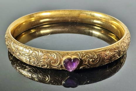 Antique 14K Gold, Amethyst Bangle Bracelet: Antique 14K Gold and Amethyst Bangle Bracelet. Crafted of 14K yellow gold with hand chased scroll foliated decoration, set with heart cut amethyst stone. Good condition, measures: 2.9" D, Assembledwei