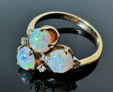 Antique 14K Gold Opal and Diamond Ring: Antique 14K Gold Opal and Diamond Ring. Crafted of 14K yellow gold set with three quality cabouchon opals with five small round cut diamonds. Good condition, total assembled weight: 2.4 Dwts, Ring siz