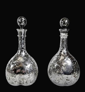 Pair, 1892 Silver Overlay Decanters, Gorham (2pc): Pair of 19th C. Silver Overlay Decanters, Signed "Gorham". Blown glass with stoppers, hand chased decorative foliate silver overlay. Center cartouche with monogram. Good condition, measures: 11.5" H x