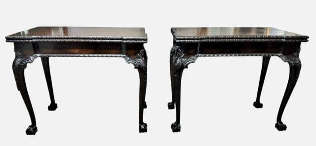 Pair George III Carved Mahogany Games Tables (2pc): Pair of 19th C. English George III Style Carved Mahogany Games Tables. Flip top tables with hinged leg extension. Carved gadroon edge with French legs carved with foliate medallion decoration, termina