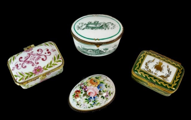 French Hand Painted Porcelain Pill Boxes (4pc): Collection of Four Hand Painted French Porcelain Pill Boxes. Hinged lidded boxes with diverse decoration. Several signed at base, Limoges. Good condition, largest measures: 2" H x 2.75" W.