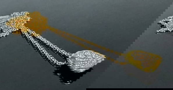 18K Gold and Diamond Necklace, Tiffany & Co: 14K Gold and Diamond Necklace, SIgned, "1981 T & Co 18K" and "Peretti" (Elsa Peretti). 14K yellow gold link chain with 18K gold modernist pendant, set with twenty-five small round cut diamonds of good