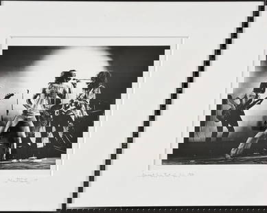 1969 Photograph, Led Zeppelin, Peter Tarnoff: 1969 Photograph, Led Zeppelin, Signed "Peter Tarnoff" Numbered "4/25", Titled "Newport Jazz Festival July 1969". Image of Robert Plant on stage with band in background. Good condition, matted and fram