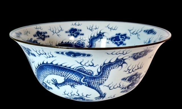 Antique Chinese Porcelain Dragon Bowl: Antique Chinese Blue and White Porcelain Bowl. Hand painted with dragon and cloud decoration with copper rim. Good condition, measures: 6.25" H x 15" W