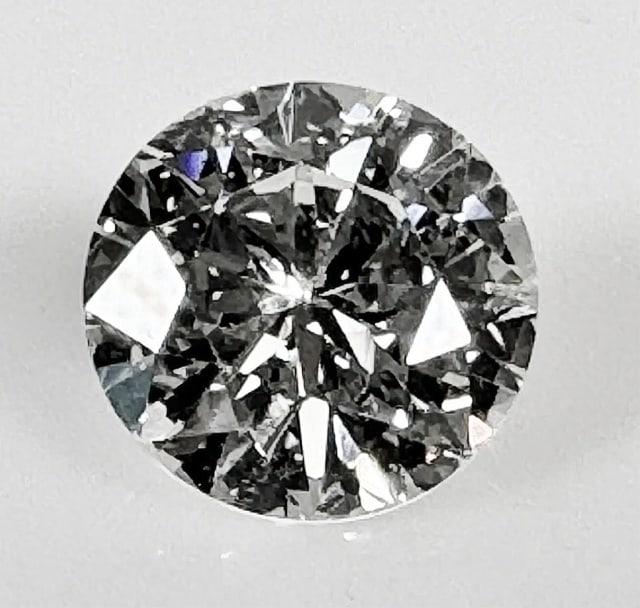 GIA Certified Diamond,3.37 cts, VVS2, M Color: GIA Certified Natural Round Brilliant Cut Diamond, Evaluated as 3.37 cts, VVS2, M Color. Large diamond with original 14K gold prong pendant setting, accompanied by full GIA lab report. Measures 9.90 -