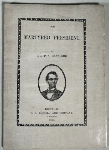Book, "Our Martyred President" By Hanaford, 1865: Pamphlet, "Our Martyred President" by Mrs. P.A. Hanaford (Boston: B.B. Russell and Company, 1865), 8vo, wraps, n.p. Frontispiece lithograph of President Lincoln. Inscribed by the author in pencil on f