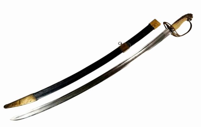 British Napoleonic P1796 Light Cavalry Sword: British Napoleonic Wars Era Pattern 1796 Officer Light Cavalry Sword with Personalization. Single fullered curved steel blade, ricasso marked "G", (likely Osborn & Gunby). Reticulated brass guard with