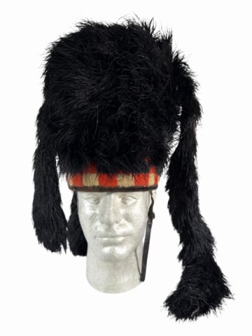 British Black Watch Scotts Feathered Bonnet: World War One Era British Black Watch Feathered Bonnet. Fabric construction with black feather surface adornment with checkered wool band and interior leather band. Good condition, feathers shedding, 