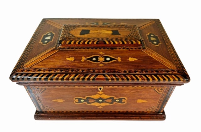 19th C Sailor Made Marquetry Inlaid Coffer Box: 19th C. Sailor Made Inlaid Jewelry or Coffer Box. Hinge lidded mahogany box with lock, with Intricate multi wood marquetry inlayed decoration. themes of clasped hands, mother of pearl hearts, medallio
