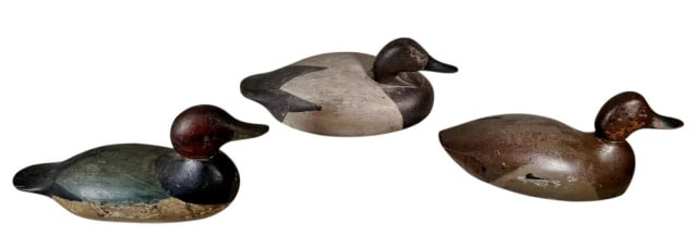 Antique New England Duck Decoys (3pc): Three Antique Hand Carved and Painted Wooden Duck Decoys: (1) Redhead duck with tack eyes and lead weight at base, (1) Maine slot head tack eye hollow body decoy, (1) Decoy (possible dodge factory) wi