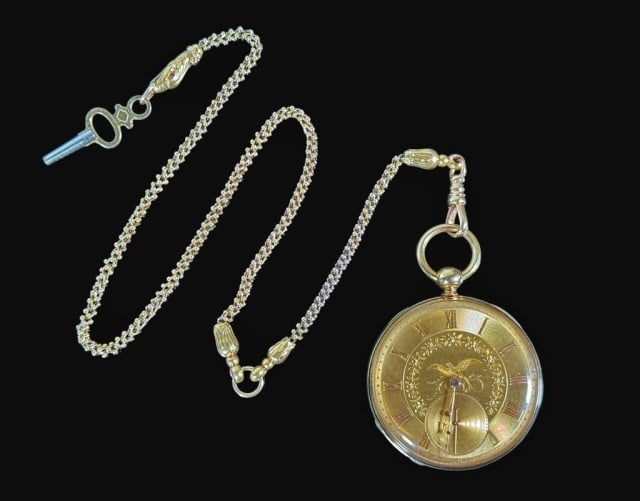 18K Gold Swiss Pocket Watch, Brietling Laederich: 19th C. Swiss 18K Gold Pocket Watch and Chain, Signed "Breitling Laederich". 18K yellow gold engine turned open face case. Swiss 13 Jewel Keywind Lecoultre style movement. Gold face decorated with eng