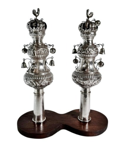 Antique Continental Silver Torah Finials: Pair of Antique Continental Silver Torah Finials, "Rimonim". Traditional form with floral and foliate repousse and hand chased embellishment with suspended silver bells and balls ( two missing). Finia