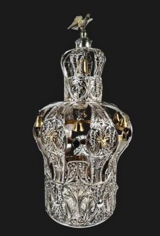 Antique Russian Silver Torah Crown: Antique Russian Silver and Gilt "Keter" Torah Crown. Hallmarked "84". Traditional form Torah Crown with open work body, suspended bells and intricate filigree. Crown topped with an ornamental winged b