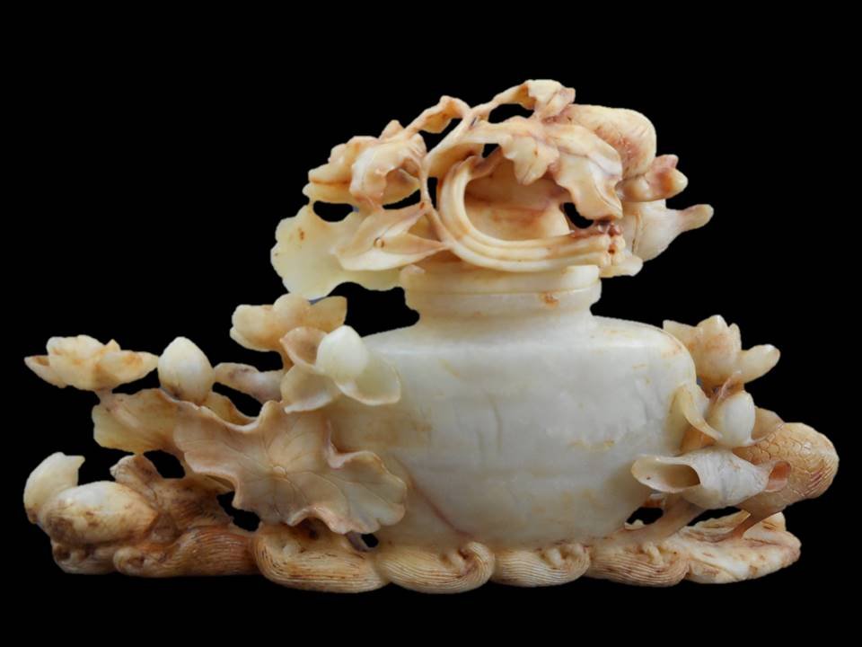 Jade Lidded Vessel: Lidded jade vessel in detailed openwork featuring cranes, fish, birds, lotus blossoms and leaves with incised details. Carved in white jade with yellow, russet and brown suffusion. Likely Qing Dynasty