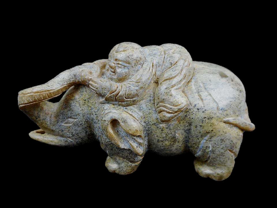 Jade Elephant,Southern and Northern Dynasties: Green jade elephant with rider having incised details with well worn grooves. Diffuse calcification. Southern and Northern Dynasties (220-581 AD) unearthed in Henan Province. 2.75"H x 5"L