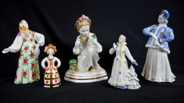Five Porcelain Dulevo Figurines: Collection of five porcelain figurines manufactured by Dulevo. 1) Figure fashioned after Pavel Bazhov's fairytale, "The Malachite Casket" in iridescent glaze with gilt accents. Green factory mark. 8.5