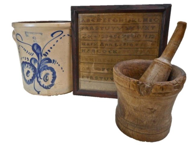 Antique Primitive Group: One stoneware crock in blue floral design with impressed number "3", manufactured by F.T. Wright & Son. Rim roughage to interior and exterior 11"H. Antique wooden mortar and pestle with several areas 