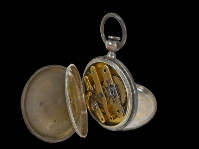 Henry Beguelin Key Wind Pocket Watch: Silver full hunter case with Roman numeral porcelain face, having a separate second hand dial. Interior back engraved, "Henry Beguelin Locle Straight Time Patent Lever Full Jeweled". Case is hand engr