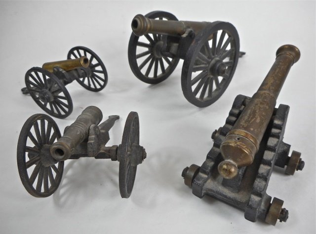Collection of Antique Model Cannons: Brass tubes on cast iron carriages. Three field and one Naval cannon. 5.25" - 8.5"H