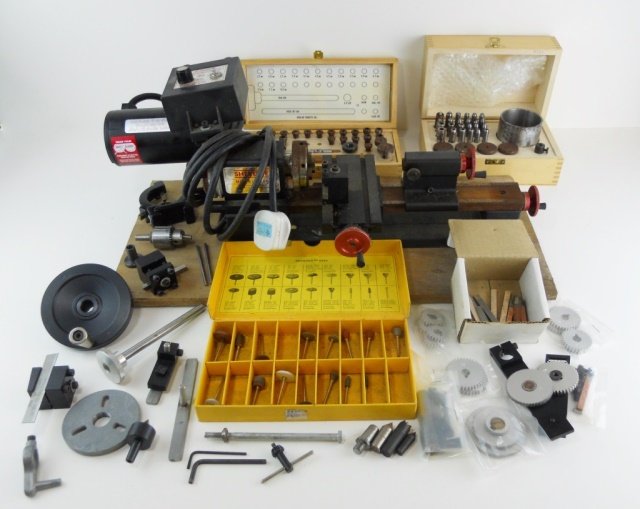 Sherline Mini Mill and Accessories: Sherline Mini Mill (P/N 4345) with accessories: Bergeon No. 5420 - assortment of brushing wheels (missing three items), Sherline products collet set (missing three collets), Bergeon stake set (some ru