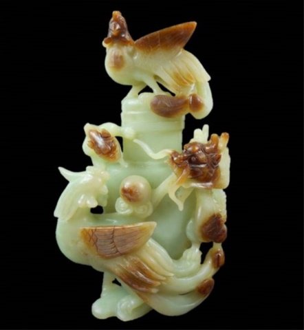 Chinese Jade Vessel: Green carved jade lidded vessel with openwork renderings of birds and mythological beasts. Russet and brown suffusion. 9.25"H Provenance: Private Massachusetts collection.