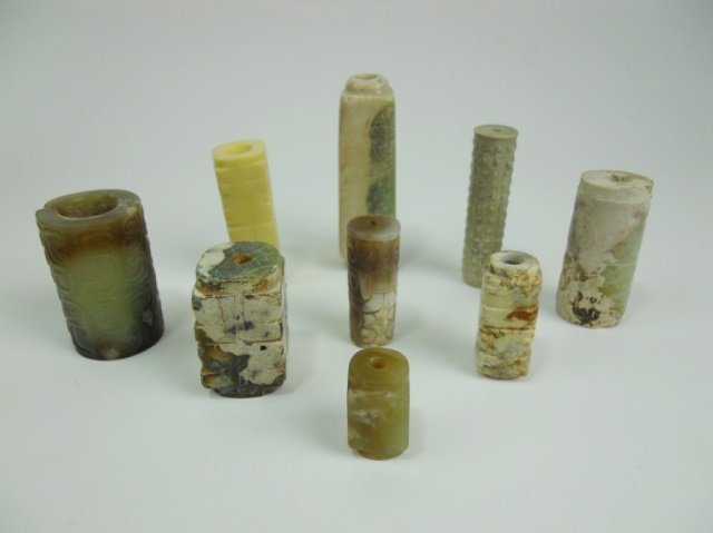 Assorted Chinese Jade and Stone Cong Beads: Collection of nine Chinese jade and stone cong shaped beads of various age and composition. Largest measures 2.75" L Provenance: Private Massachusetts collection.