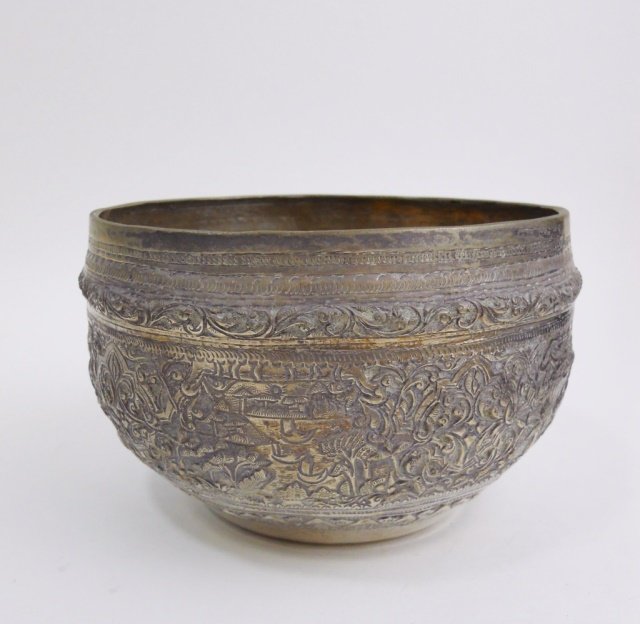 Antique Thai Silver Repousse Bowl: 19th Century hand chased in floral and foliate design with village scenes. 5.75" in diameter. 11.4 Ozt Provenance: Private Massachusetts collection.