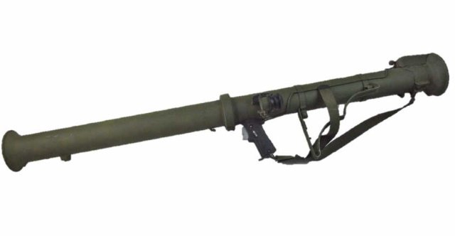 INERT Korean War U.S. M20 Super Bazooka: Two piece smooth bore tube with shoulder rest and plastic gripped trigger assembly. Folding optical site with rubber eye cap. Olive drab painted surfaces with serial number 285906 on plate. Lower tube