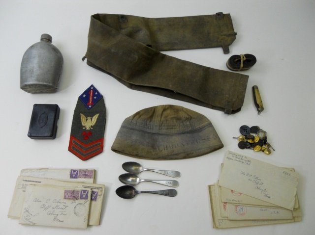 WWII U.S.S. De Haven: Life Ring, Personal Effects: Fifty-five piece collection of personal effects belonging to Alexander Camby Colburn (1912-2011), the last surviving crew member of the U.S.S. De Haven (DD-469) rescued from the waters of Guadalcanal 