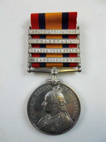 British South Africa (Boer War) Medal: Die struck silver, obverse with Queen Victoria and "VICTORIA REGINA ET IMPERATRIX" Reverse with Victory holding forth laurel wreath to marching soldiers. Clasps read, "SOUTH AFRICA 1902", "TRANSVAAL",