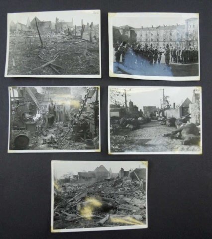WWII German Official Photographs (5pc): Five black and white glossy photographs depicting bomb damage. Reverse stamped, "Der Polizeiprasident, with additional stamps and signatures. 6.75" x 4.8
