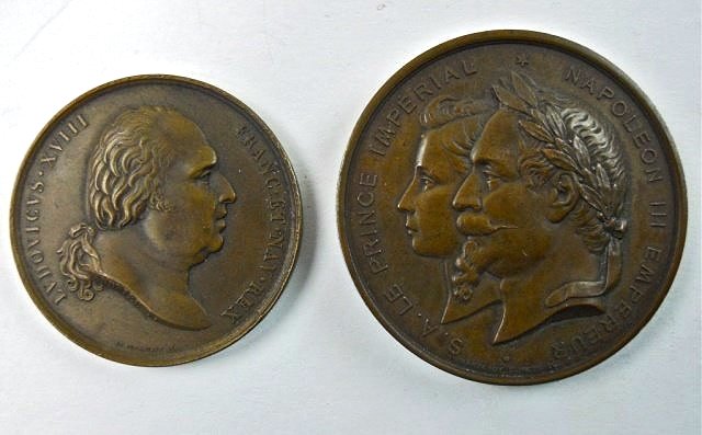 Two 19th C. French Medals Struck in Bronze: One medal carries profile of King Louis XVIII signed "ANDRIEU F." reverse depicts four horses and carriage with tableau "CINERES LUDV XVI ET MAR ANTON" with 1815 date in roman numerals. Measures 2"D. 