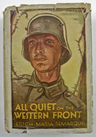 'All Quiet on the Western Front', First Edition: REMARQUE, ERICH M. - 'All Quiet on the Western Front.' American First Edition Hardcover, Gray cloth boards and spine with printed text. Original dust jacket designed by Paul Wenck with edge chips and 