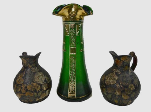 Art Deco Vase and Two Earthenware Pitchers: Art Deco gilded enamel and glass fluted Bohemian vase, likely the work of Julius Muhlhaus. Gilded mark at bottom, "329/10" with roughly finished pontil. Measures 13.25" H. Accompanied by two 7" H anti