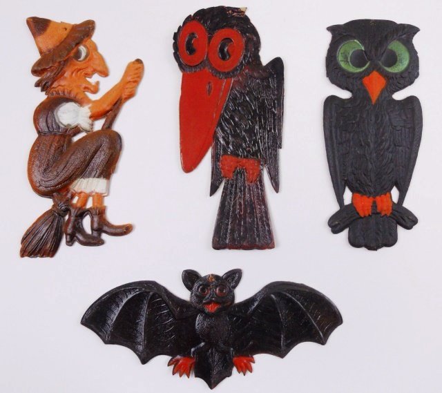 Vintage German Die Cut Halloween Decorations (4): Four vintage German embossed die cut cardboard Halloween decorations, circa 1920's-1930's. Largest item measures 7.75" H. Small areas of loss.