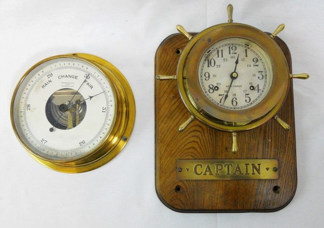 Taylor Barometer and Seth Thomas Ship's Clock: Vintage 8" Taylor barometer signed, "Taylor, Rochester, N.Y., U.S.A., Toronto Canada" on face. Together with a 9" Seth Thomas Ship's wheel clock mounted to a 9" x 12" wooden plaque with brass plate th