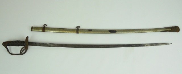 Indian Wars Model 1872 Saber: Brass hilt decorated with patriotic shield and crossed swords, guard with eagle clutching arrows and olive branch with thirteen stars. Leather and brass wire wrapped grip, single fullered curved steel