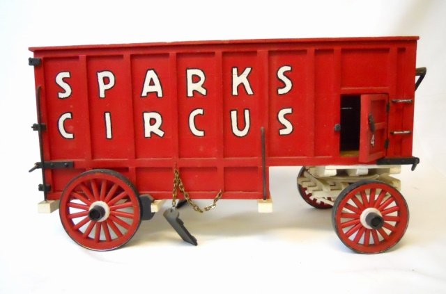 Vintage Sparks Model Circus Wagon: Hand crafted and painted model #4 circus wagon, of wood construction. Measures approximately 7.5" H x 13.5" W x 5" D.