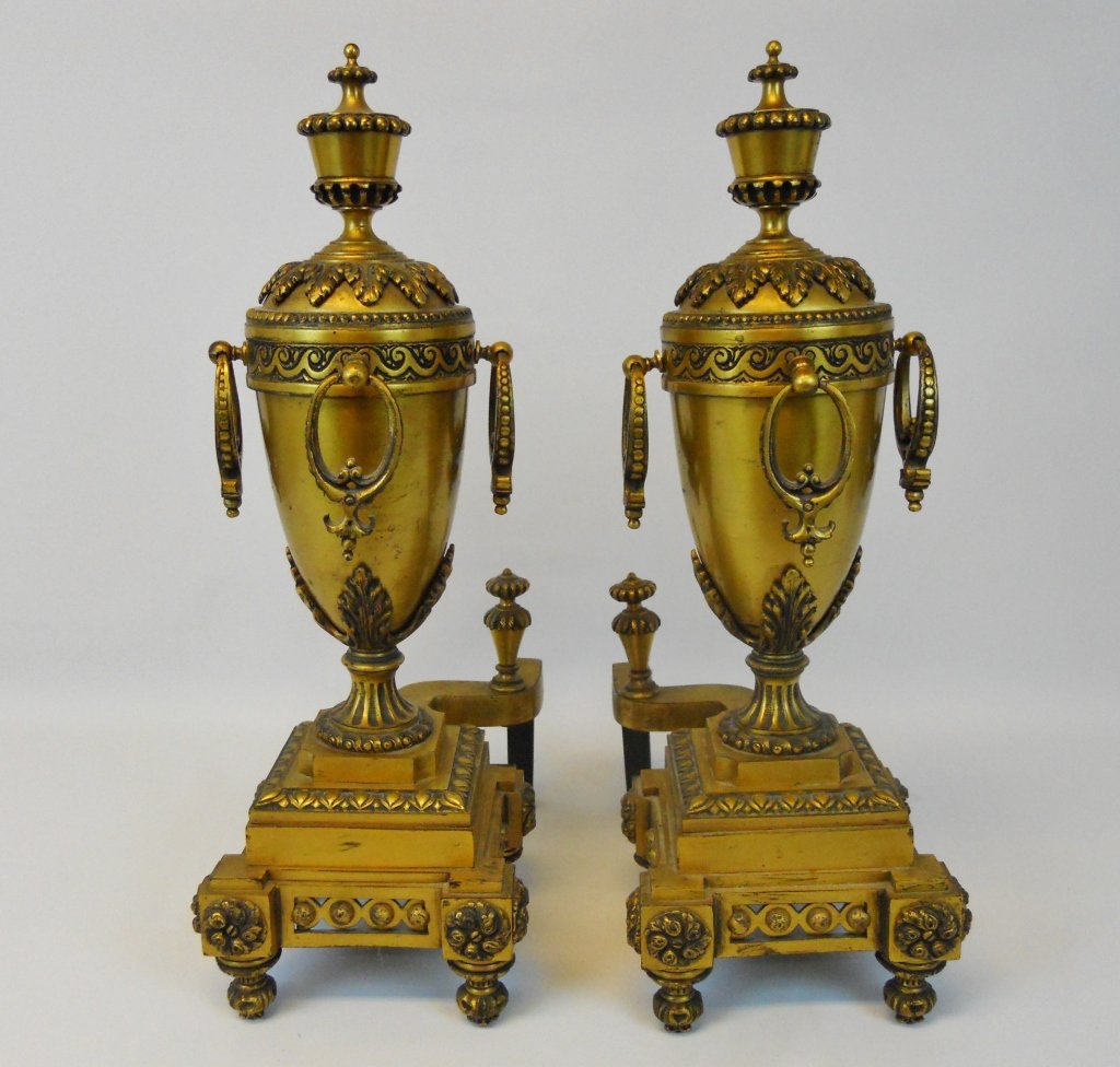 19th C. Louis XVI Style Chenets (Andirons): Pair of French gilt ormolu over bronze Louis XVI style andirons. Measures 20" H.