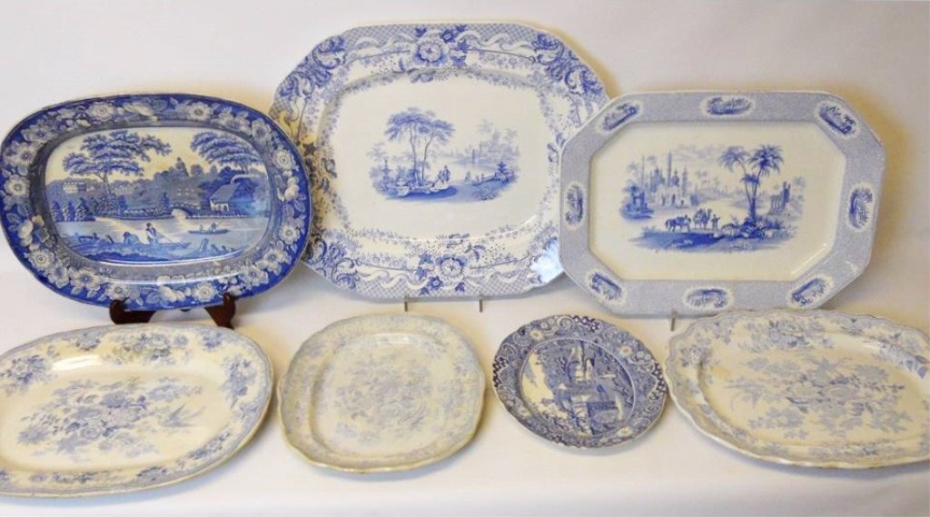 Antique Blue & White Transferware Platters (7pcs): Seven antique blue and white transferware platters of varied designs and makers, to include W.R. Midwinter, W. Ridgway and Wedgwood & Co. Items range in size from 10" H x 12" W to 18" H x 21.5" W. Sca