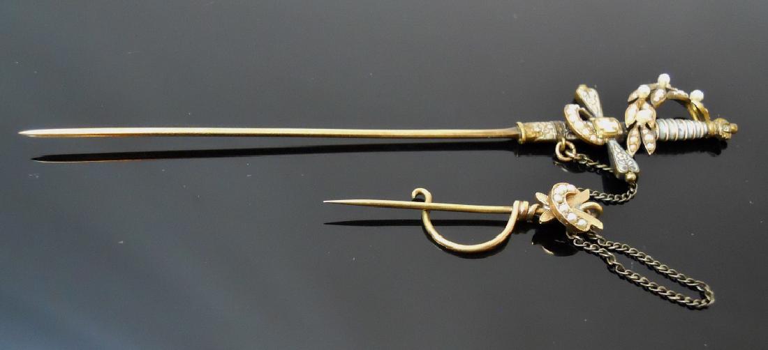 14K Gold Enamel and Pearl Sword Form Pin: 14K yellow gold sword pin with blue and white enamel, set with seed pearls. Pin with Napoleon III eagle and crown motif with smaller pin attached by chain. Total weight 8.8 g.
