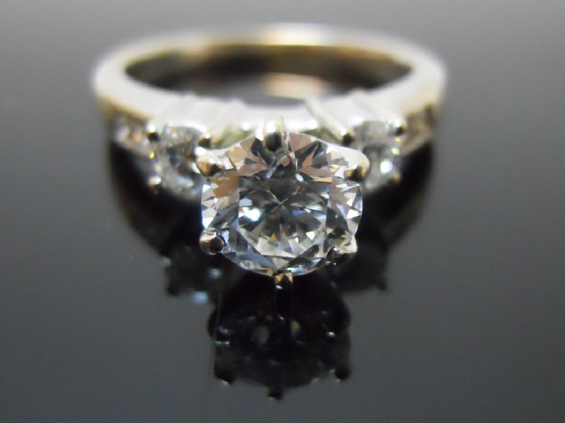 Ladies 14K Gold and Diamond Ring, Scott Kay: Scott Kay designer ladies 14K white gold and diamond ring. Center set stone is modern round brilliant cut measures 5.99mm x 5.98mm x 3.71mm, weighing .81ct with G color and SI clarity. Center stone fl