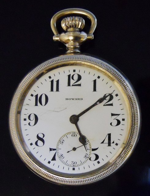Railroad Grade 21-Jewel Pocket Watch, E. HOWARD: Open face stem wind railroad grade pocket watch. White enamel face with Arabic numeral radial dial with blued steel spade and diamond form hour and minute indicator hands with inset seconds dial, sign