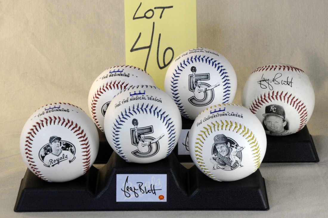 George Brett Collectible Baseballs - 2 Sets with stands: Sets include 2 plastic brown stands that hold 3 balls each. FotoBalls included are:1. McDonalds Set - The Beginning, Magical Season and Cooperstown Career balls.2. Second set includes The Beginning, M